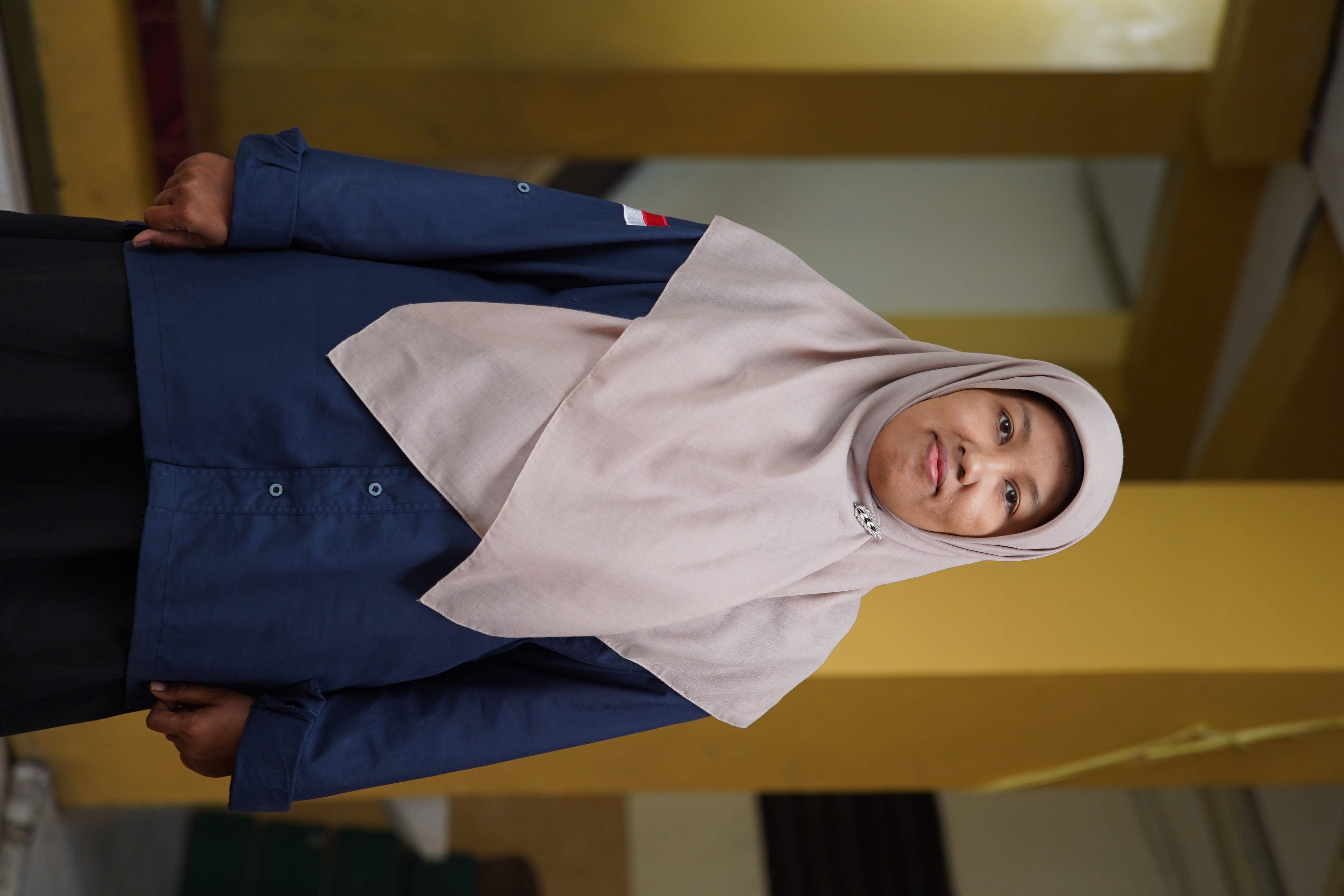 Nur Aini, S.S.
